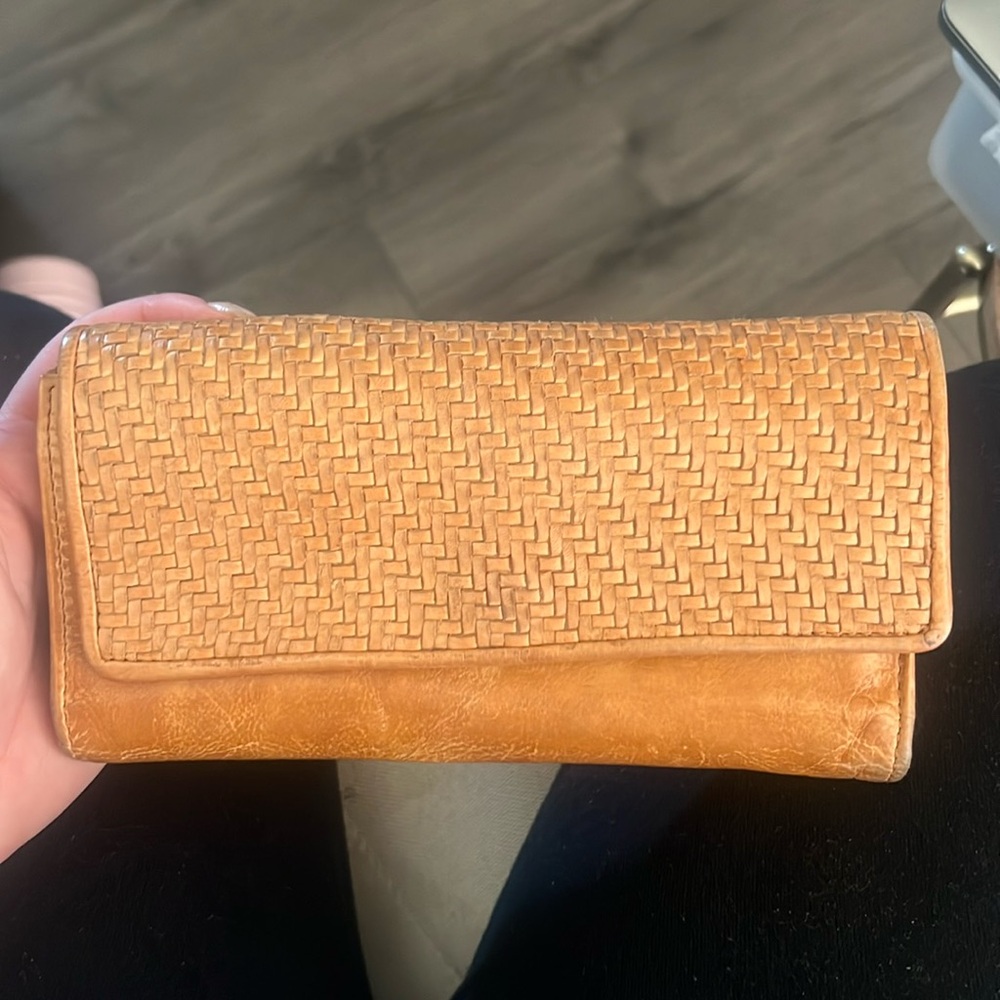 Genuine leather tri fold wallet. Lightly used